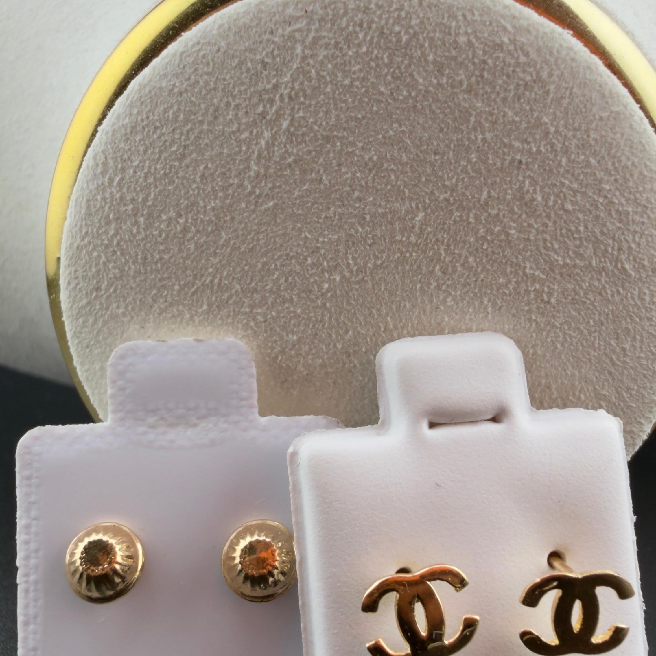 Double-C Earrings 18k.