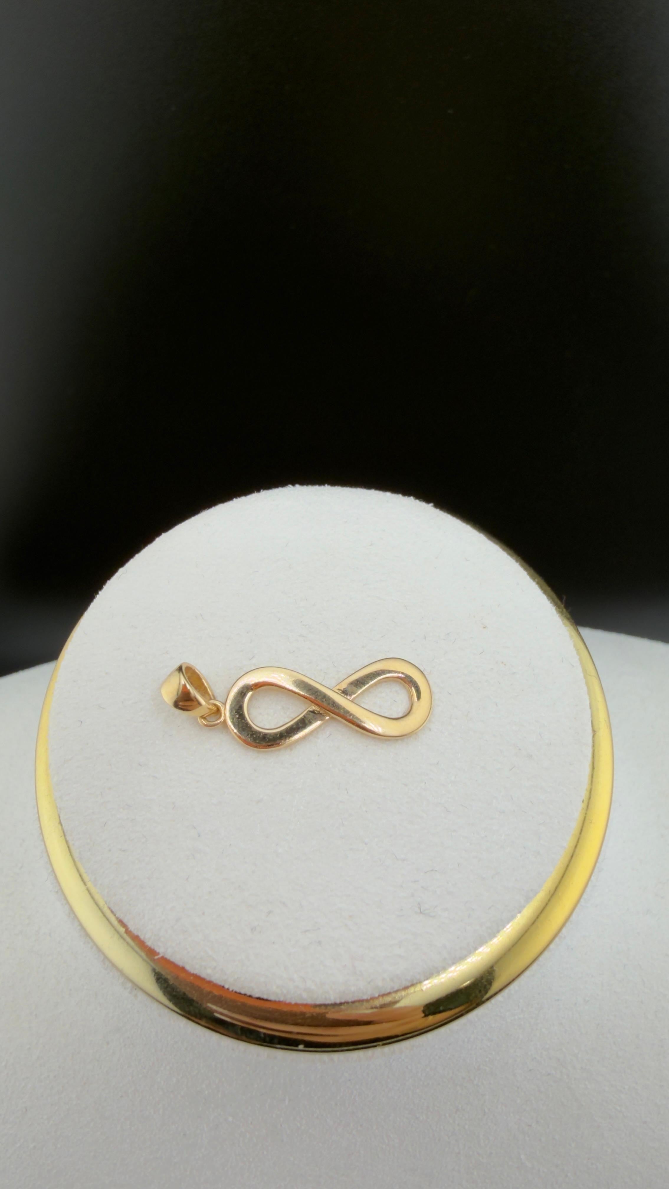 Infinite Pendant 18k.