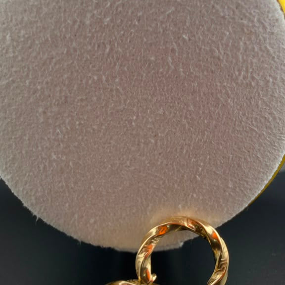 Twisted Hoop Earrings 18k.