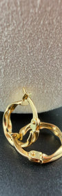 Twisted Oval Hoop 18k.