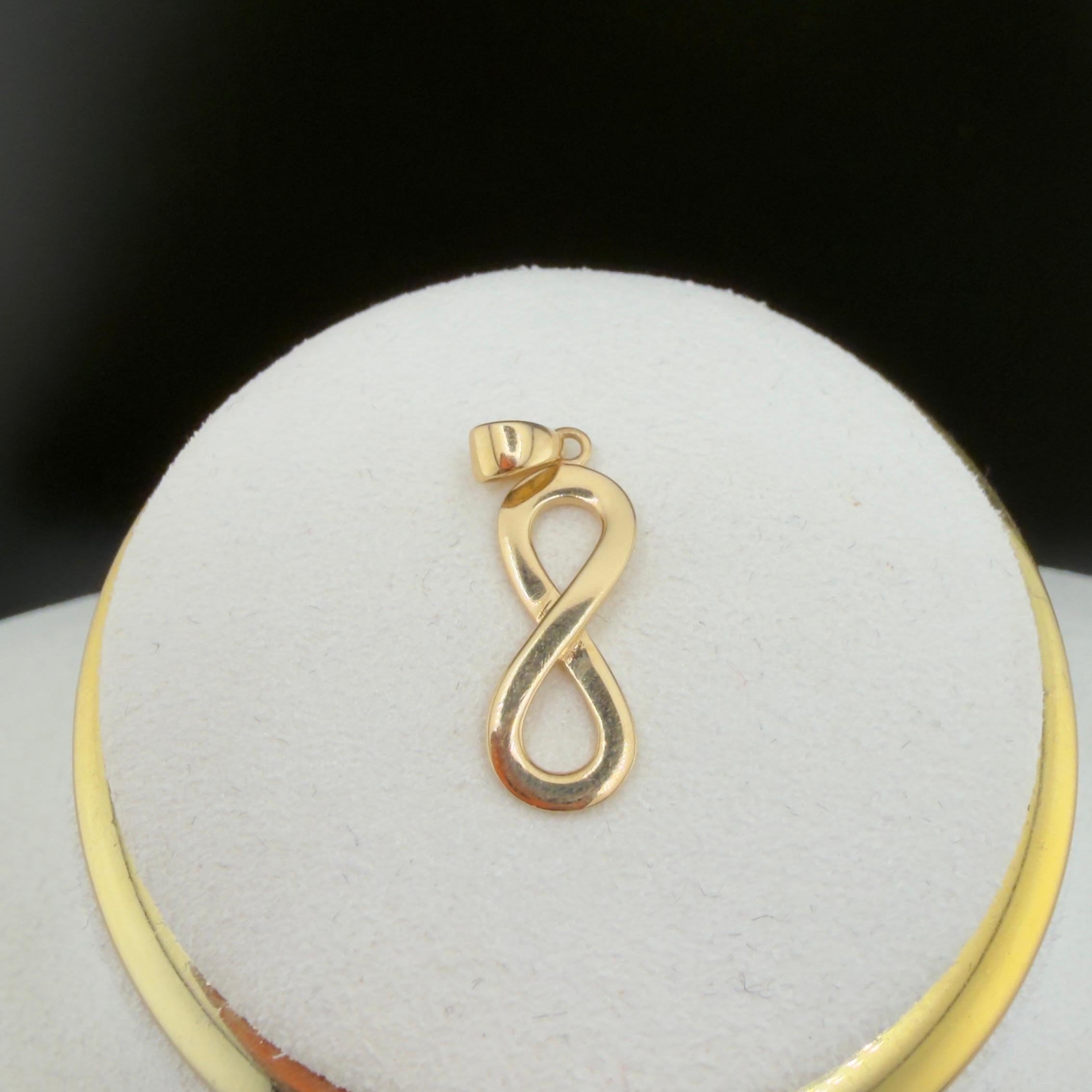 Infinite Pendant 18k.