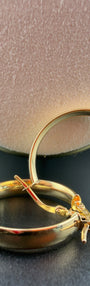 Sleek Gold Hoops 18k.