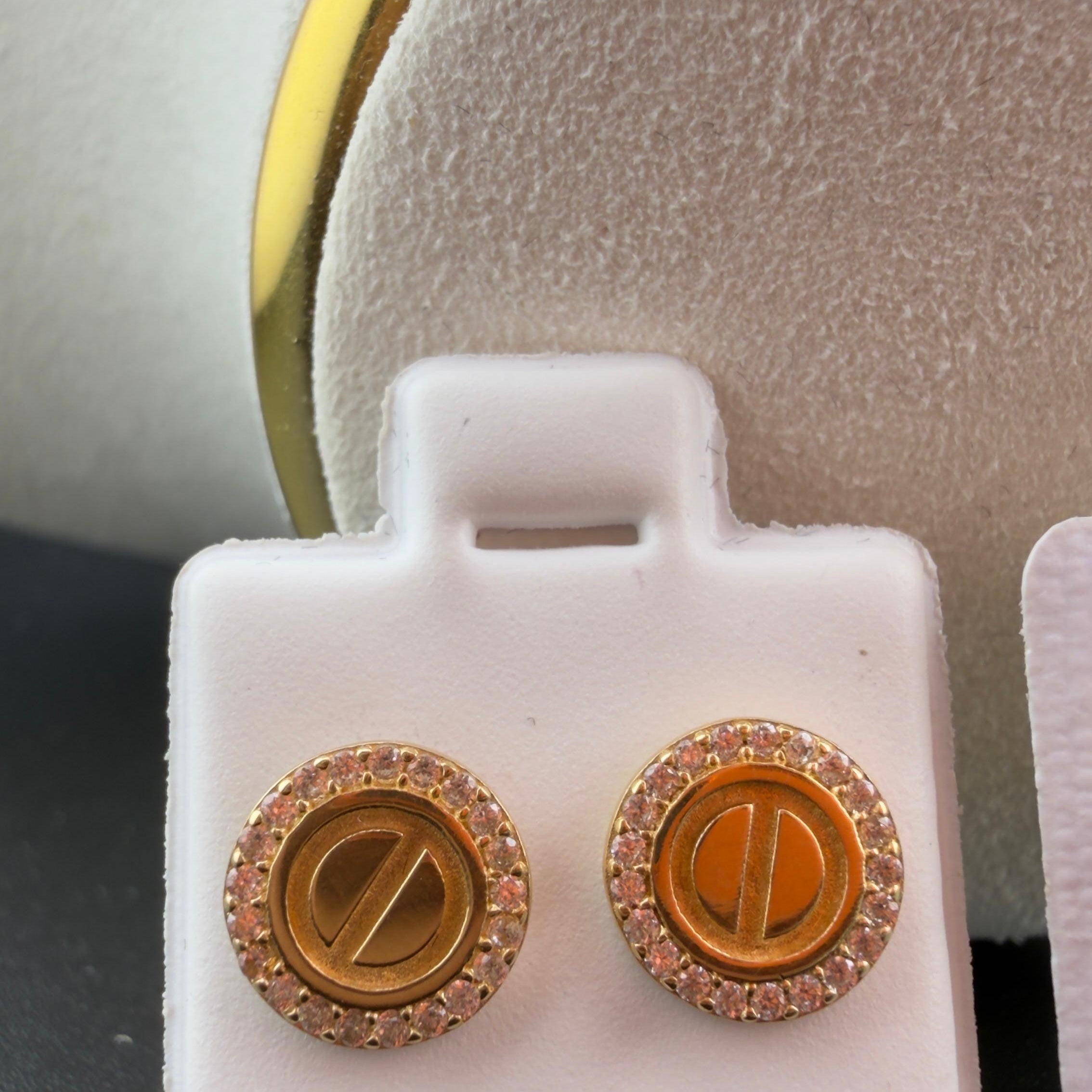 Double-C Earring 18k.